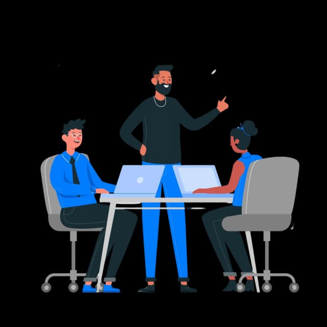 Illustration of three coworkers collaborating at a desk with laptops, one standing and leading the discussion.
