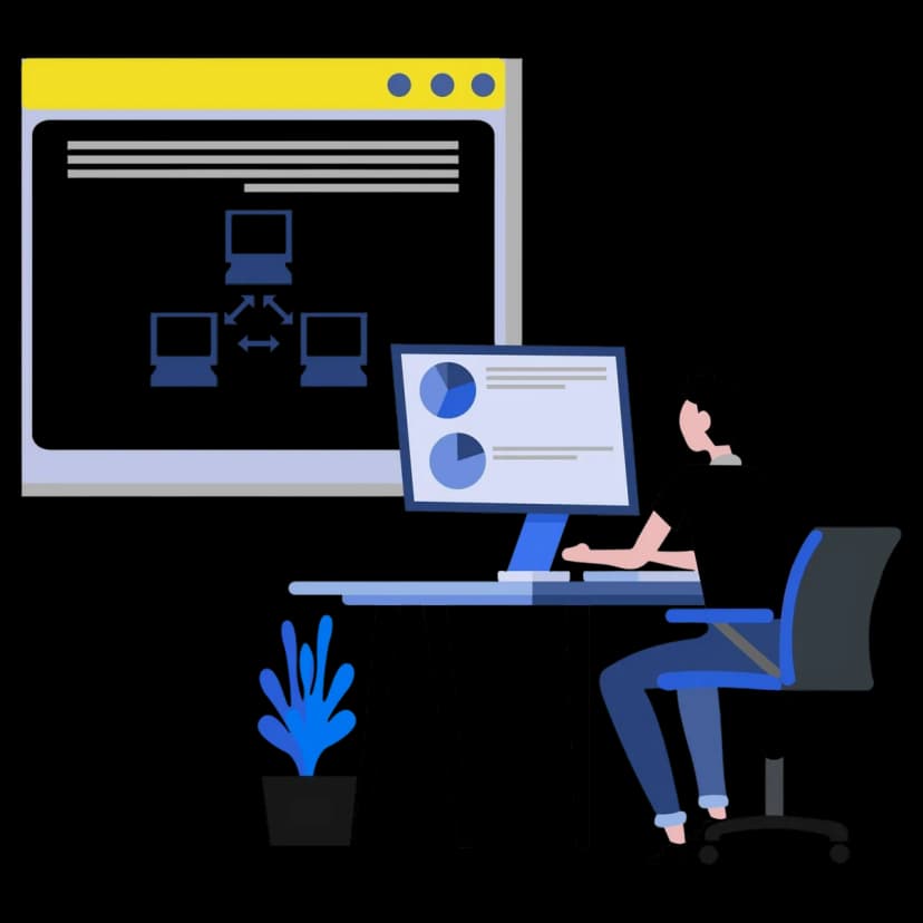 Person working at desk with computer and monitor showing network diagram and charts.