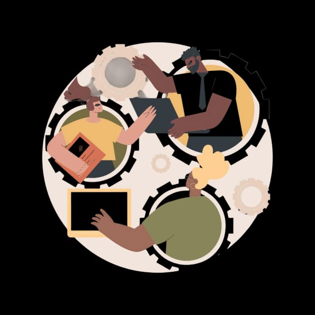 Diverse group collaborating using laptops inside interlocking gears.