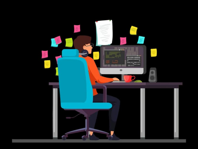 A developer coding at a desk surrounded by colorful sticky notes, representing a busy development workflow.