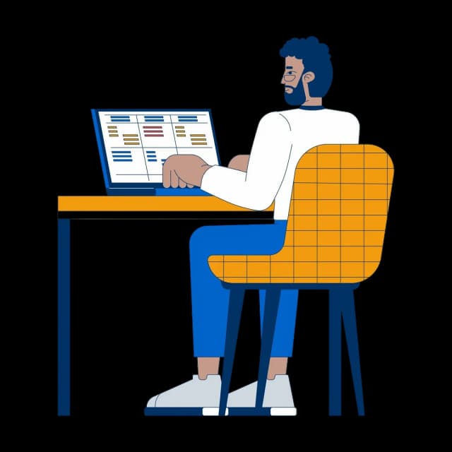 A developer working on laptop with project management dashboard