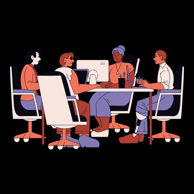 Team collaborating around a shared computer in a modern office.