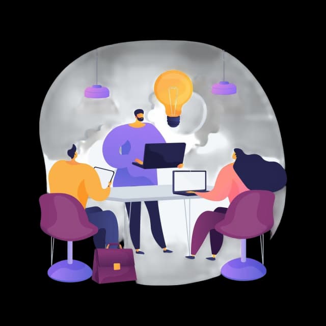 Three people working at a table with laptops and a tablet, light bulb above symbolizing ideas.