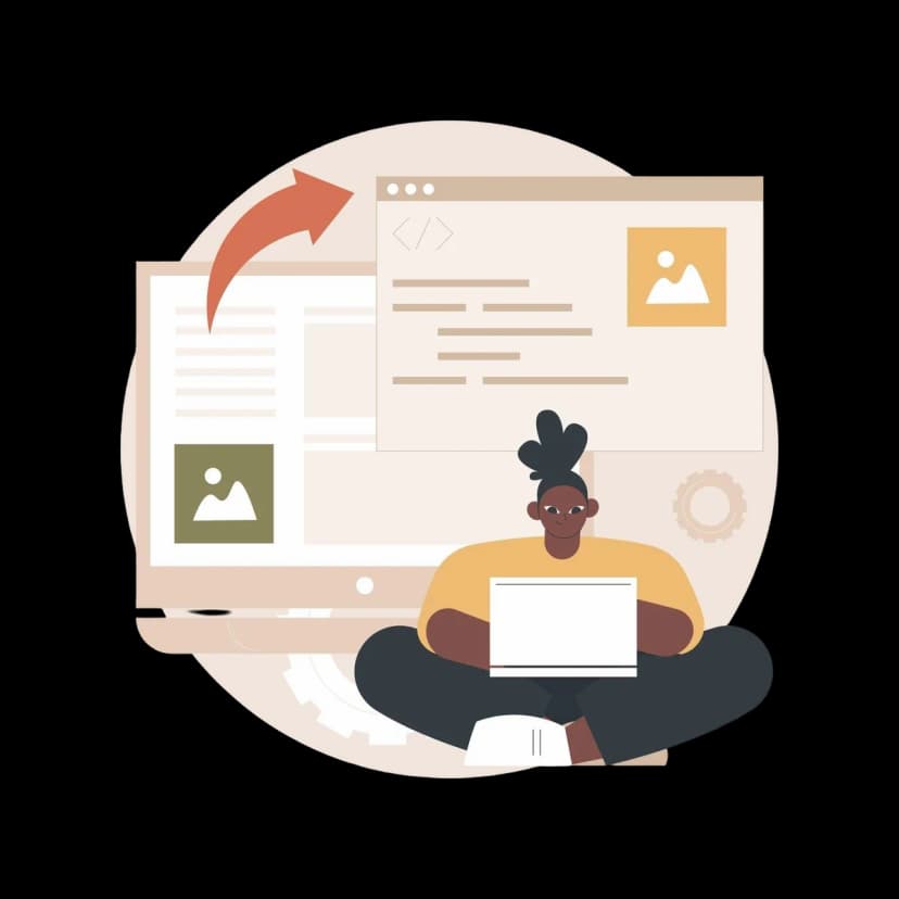 Developer sitting with a laptop, working on code and image files displayed on large screens.